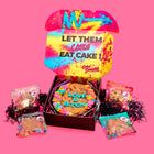 Decadent cookie cake with colorful frosting and bold blue lettering reading