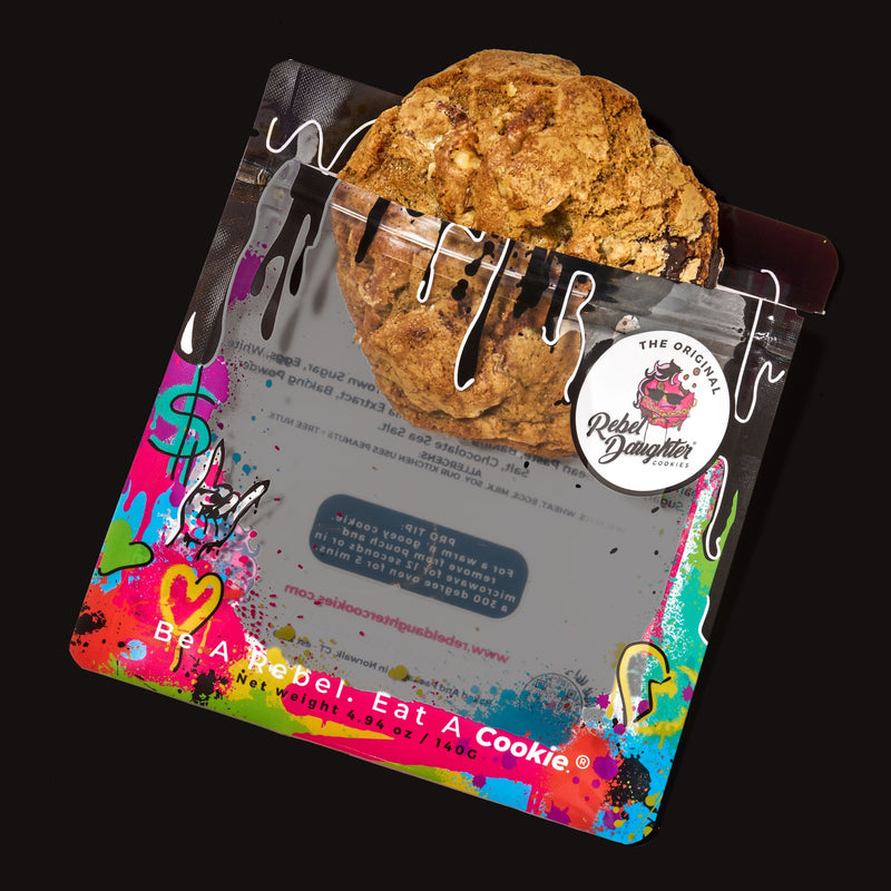 Chocolate chip with walnut cookie gift box featuring a colorful, graffiti-style package with a golden-brown cookie peeking out.