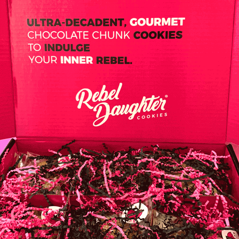 A gif of a pink Rebel Daughter Cookies shipping box showing the cookies popping up and down