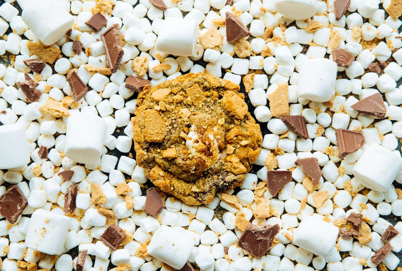 A Rebel Daughter Cookies gourmet chocolate chunk S'More, Please cookie surrounded by marshmallows, chocolate chunks and graham crackers